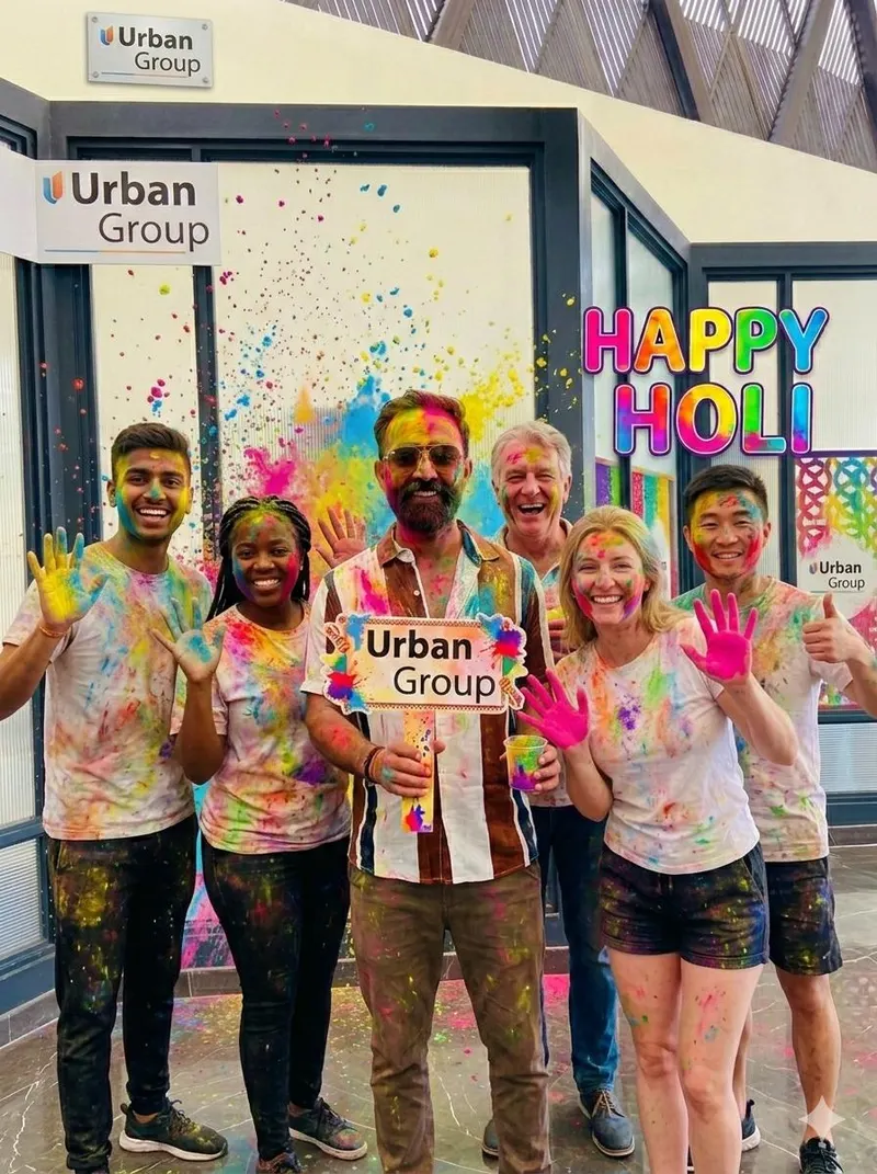 The Urban Group team celebrating Holi at the office